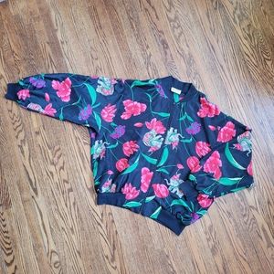 Silky floral patterned zip up bomber jacket.